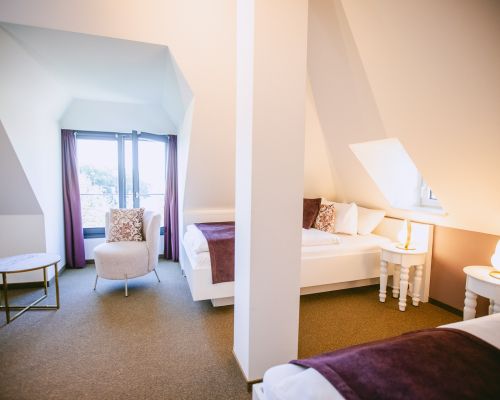Ruhiges Standard-Doppelzimmer in Wittenberg mit warmem Ambiente.