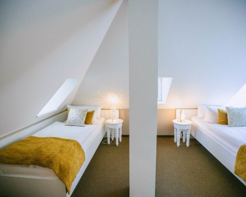 Komfortables Mehrbettzimmer für Familien und Gruppen in Wittenberg.