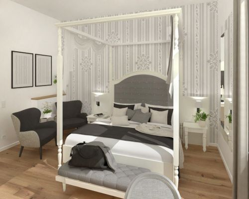 Ruhiges Hotelzimmer im Johanniterhaus mit freundlicher Gestaltung.